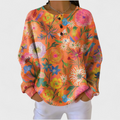 Paula | Jersey naranja con estampado floral multicolor