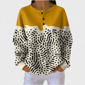 Lidia | Jersey amarillo y blanco con estampado animal